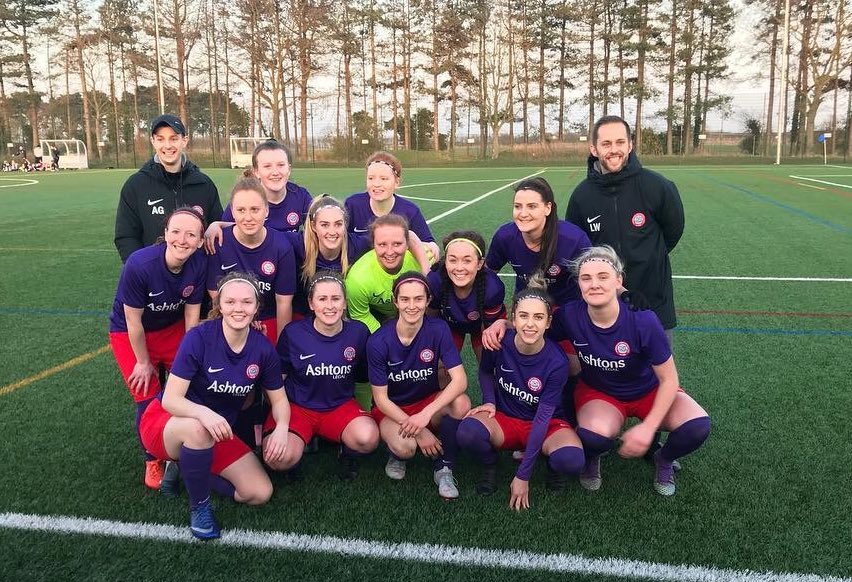 Wymondham Town Football Club Ladies 1st Team group shot of them celebrating their semi final win