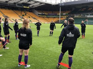 The ladies team warming up for their big final game